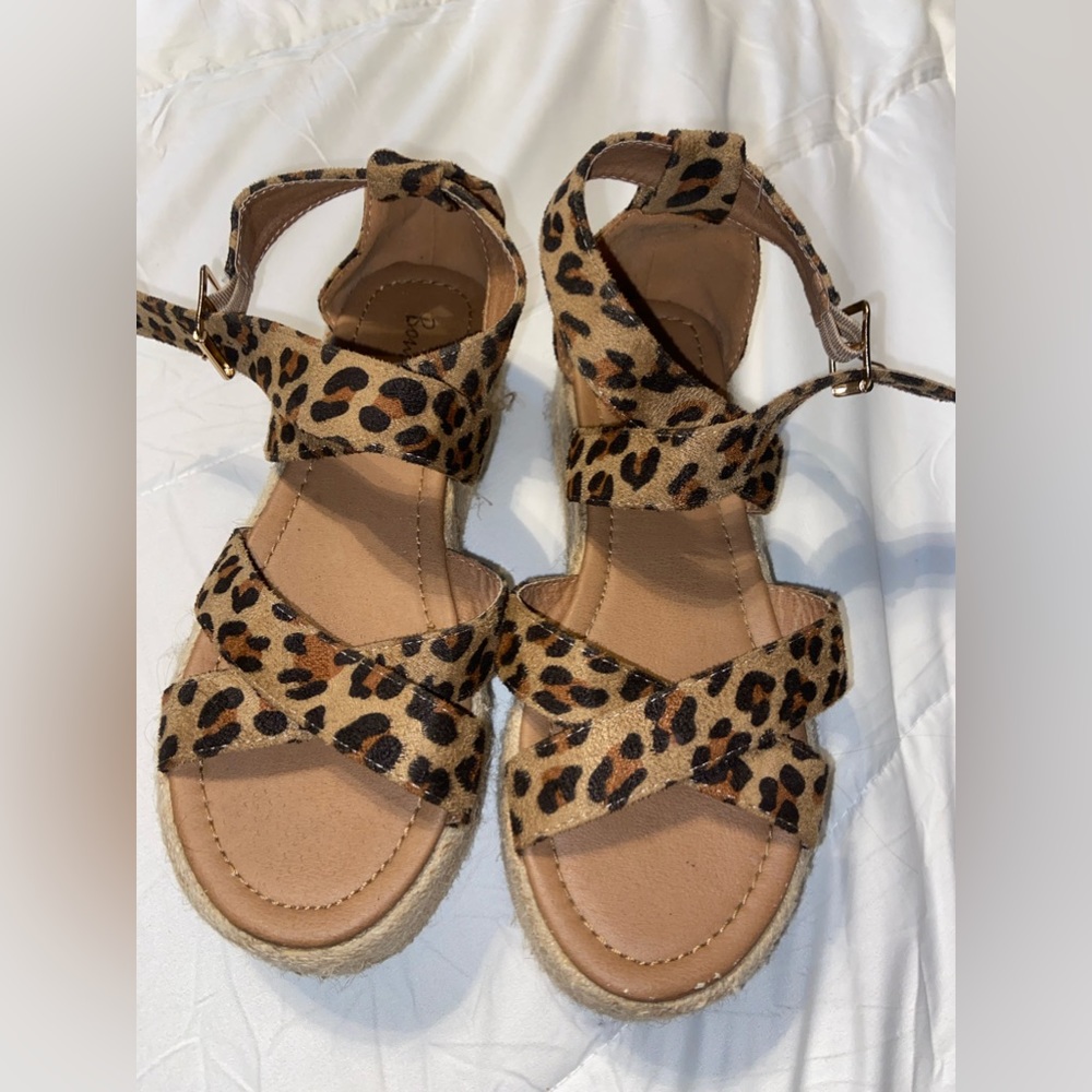 platform cheetah print sandals. brand is Bornwild.
